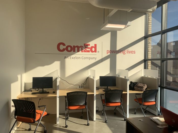 A resource sponsored by ComEd room with sunny windows shining computers.