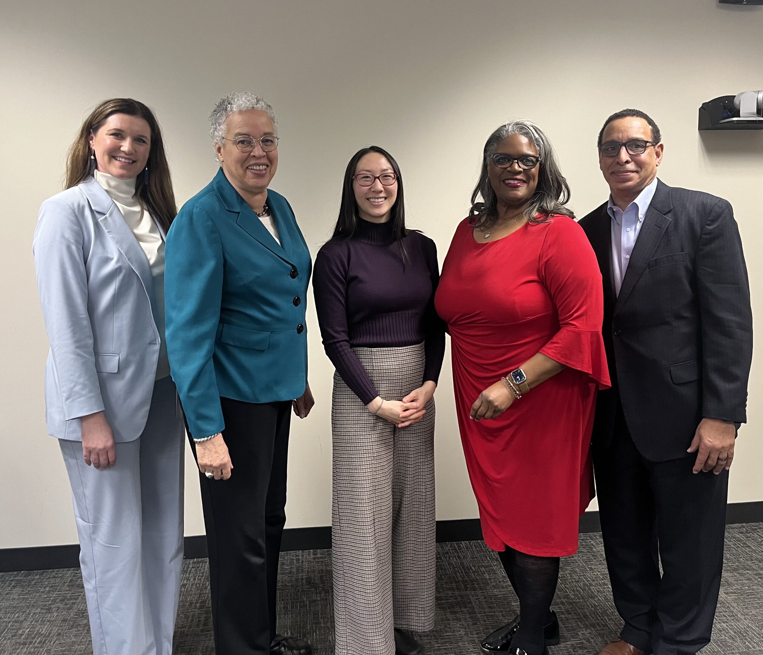 A group photo of DCEO leader, Cook County Board of Commissioners President Toni Preckwinckle, Chicago Recovery Plan Program Manager, Chicago Cook Workforce Partnership Board Co-Chair Jacki Robinson-Ivy and CEO George Wright.